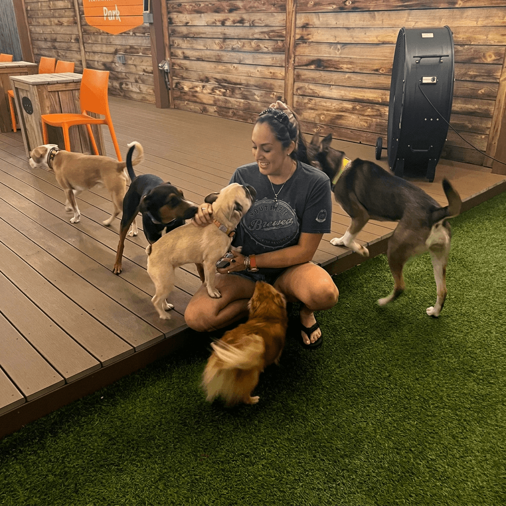April surrounded by dogs
